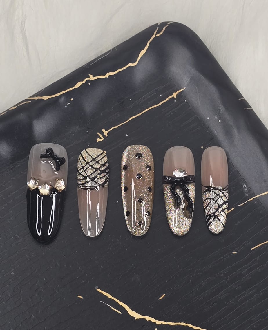 IMG-20260115-WA0000 LUXURY BLACK & NUDE BOW CRYSTAL PRESS-ON NAILS- ALMOND SHAPE, MEDIUM