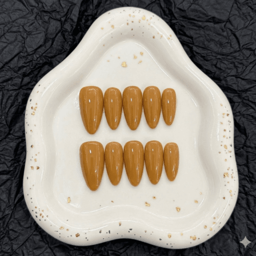 glossy mustard tan luxe almond nails